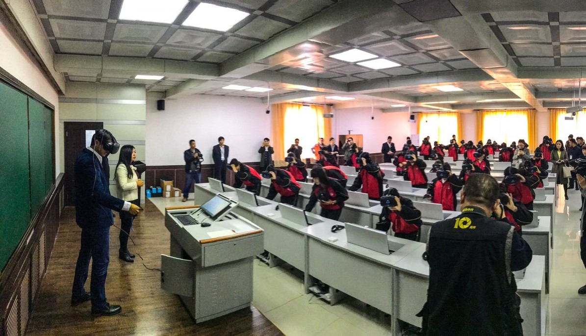 Students using VR headsets in lecture hall